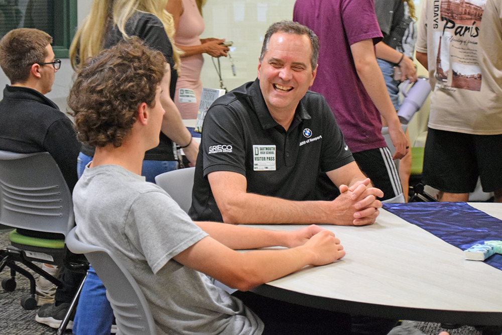 A "Ripple Award" honeree smiles at the student who awarded him. Photos by Kat Sheridan