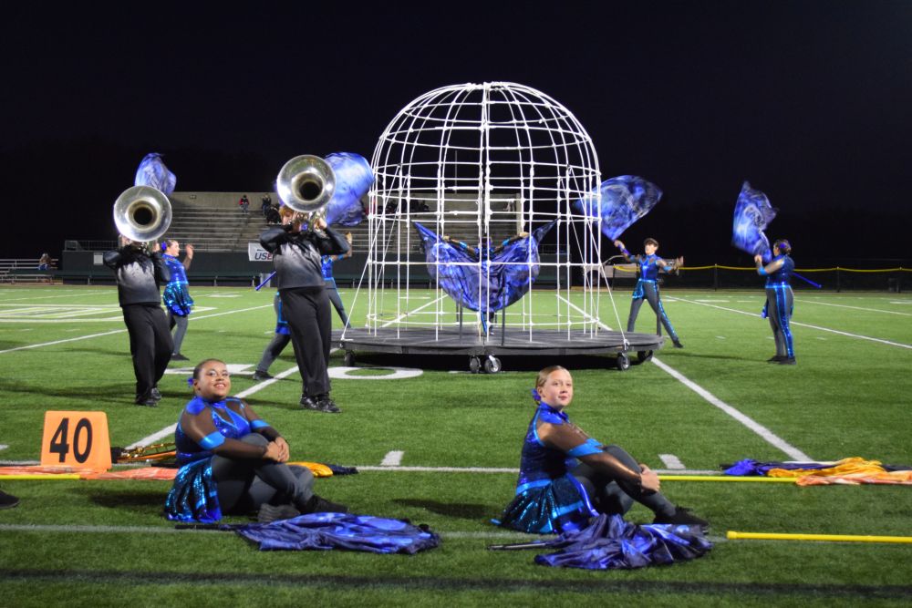 The soloist performs in the cage. Photos by Kat Sheridan