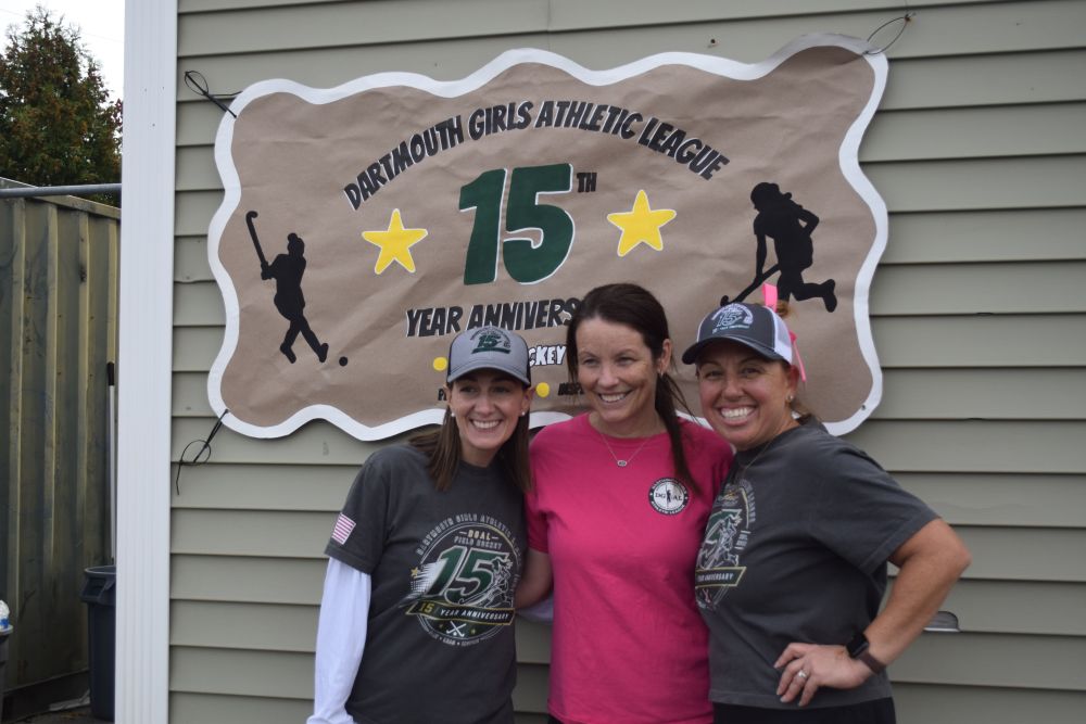 Commissioners Courtney Cohen and Nicole Mello pose with Sherri Tetrault. Photos by Kat Sheridan