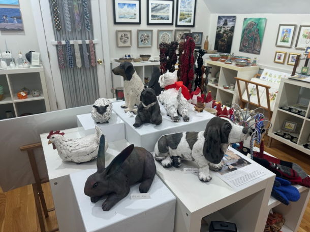 Animal statues by Ronnie Gould with more art in the background. Photos by Kat Sheridan