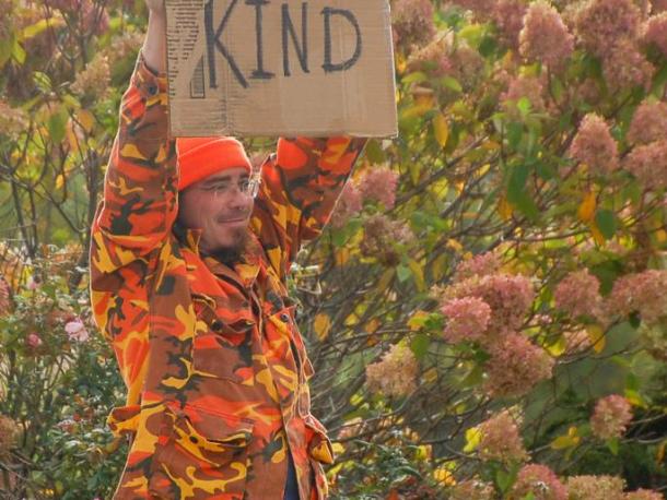 Nathan Bean holds his sign. Photos by Mari Huglin