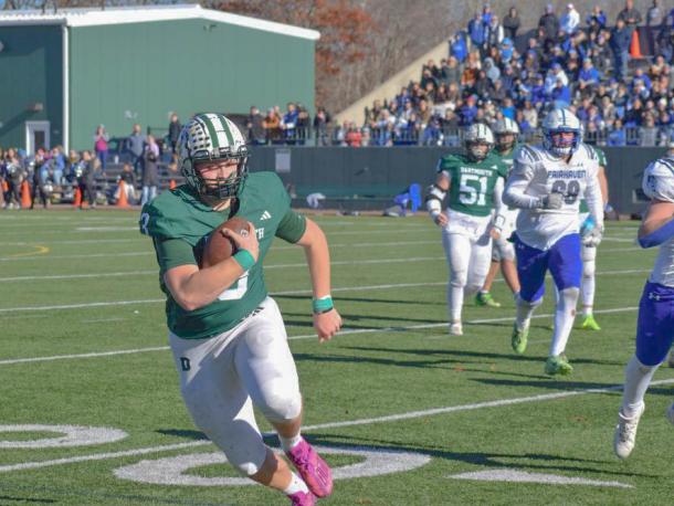 Aiden Gendron runs with the ball to attempt a touchdown. Photos by Kat Sheridan