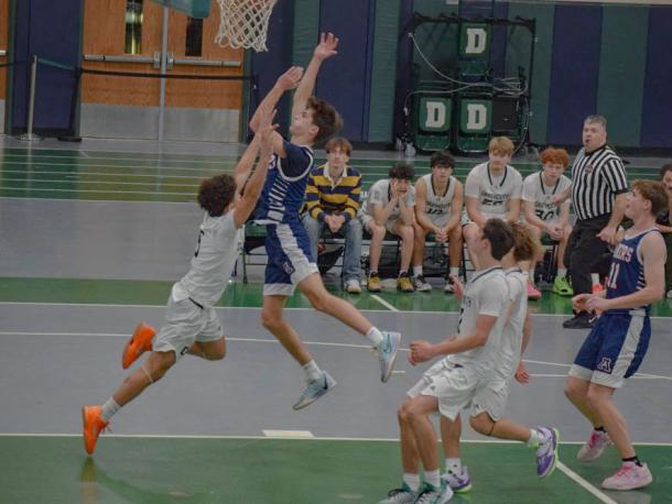 Julian Raymond blocks another player. Photos by Kat Sheridan