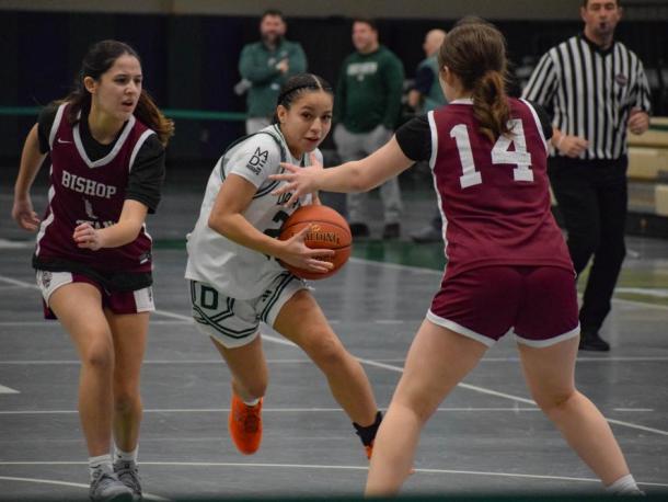Samantha Murphy blocks Annaleyah Algarin. Photos by Kat Sheridan