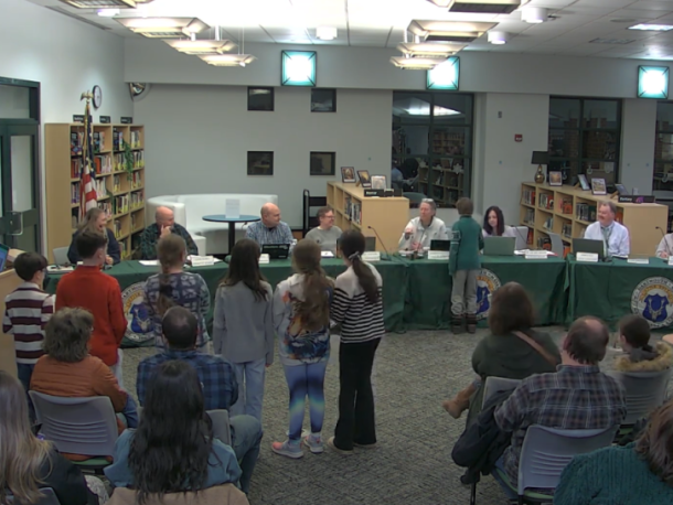 The Invention Convention team gives Silly Soap Stamps to the School Committee. Source: DHSTVmedia