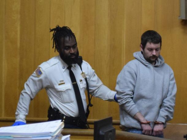 Andrew Johansen being brought into court. Photos by Kat Sheridan