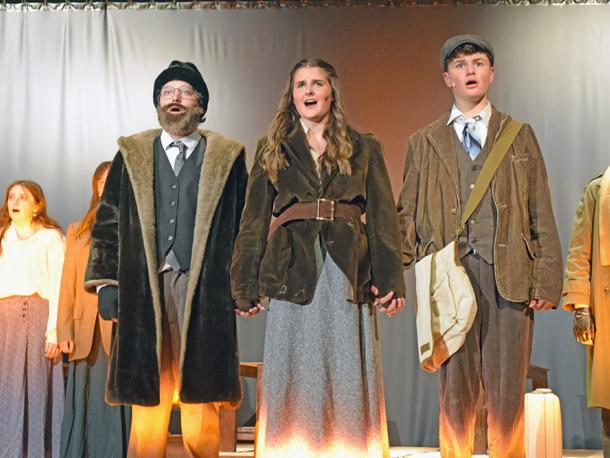 Vlad (Nolan Woodard,) Anya (Emerson Palumbo) and Dimirtry (Jack Nylin) sing before getting on the train. Photos by Kat Sheridan