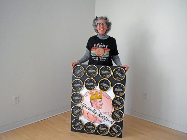 Nancy Franks with her penny retirement sign. Photo by Kat Sheridan