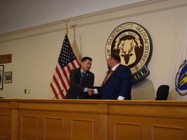 Chester Tam and Henry Bousquet shake hands at the end of the debate. Photos by Kat Sheridan