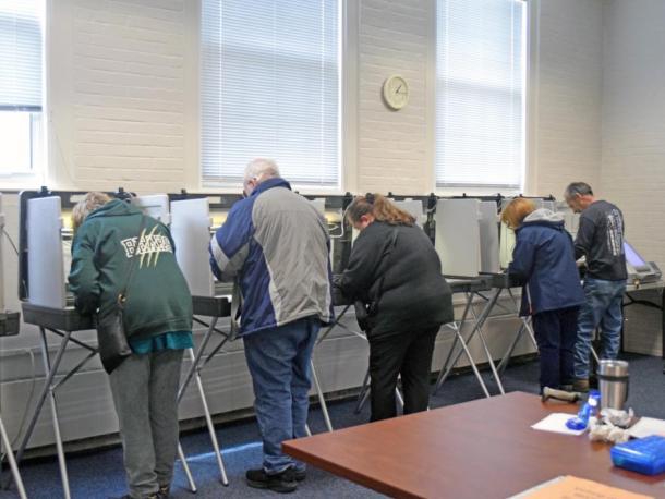Residents vote at Town Hall. Photo by Kat Sheridan