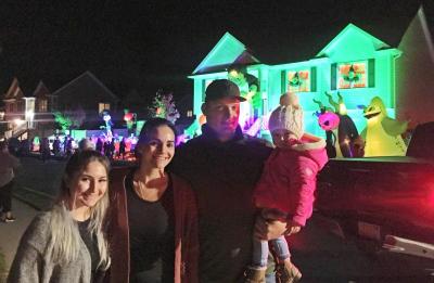 The Leverone-Porto family in front of Paiva’s house on Cotton Candy Lane.