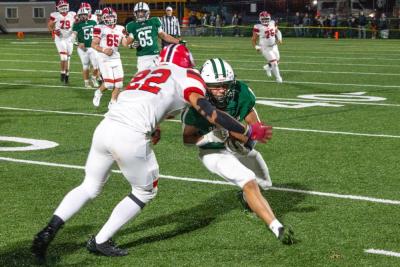 Louie Freitas is tackled after a short catch-and-run.