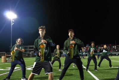 The Dartmouth High Marching Band performs at halftime.