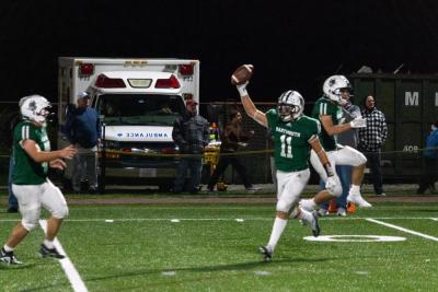 Senior cornerback Graham White takes a victory lap after making the game-sealing interception.
