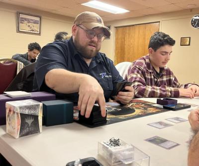 Nick Ulewicz considers his turn, while Easton Gerber watches alongside. Photos by Sean Flannelly