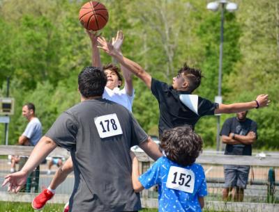 Players jump for the ball.