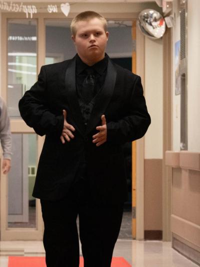 Brayden Aguiar shows off his prom fit on the red carpet.