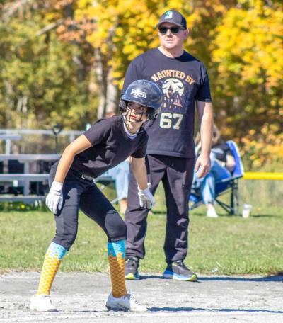 Skyler Benjamin looks for home plate. s