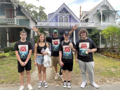 Students pose with teacher Robert Perrotti during the walking tour. Source: Robert Perrotti