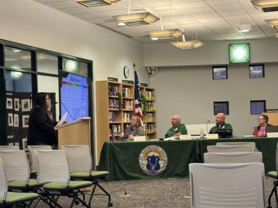 Catie Paveo explains the CKLA program to the committee. Photo by Kat Sheridan