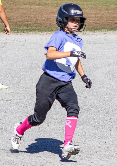 Vienna Iria runs for third base. s
