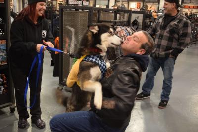 Atlas gives Rob Ruttenberg a hug and kiss.