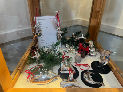 Metal ornaments available in the gallery.