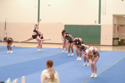 Cecelia Trahan leaps. 