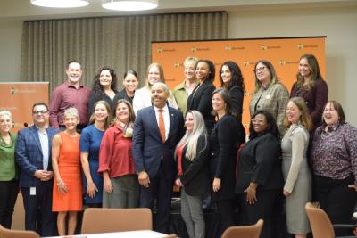 The entire Fallon team poses with Governor Maura Healey. Photos by Kat Sheridan