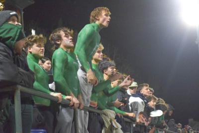 Some students painted green to support their friends. 