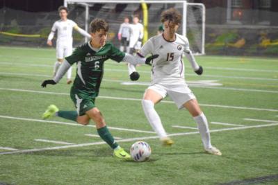 Mitchell Braydon goes after the ball. 