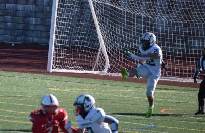 Michael Hauck kicks the ball. 