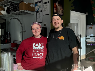 Allie Trojano and Jake Medearis pose on the soft-launch day of Lover's Bakery.