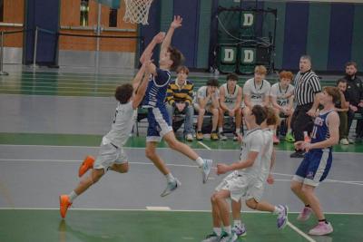 Julian Raymond blocks another player. Photos by Kat Sheridan