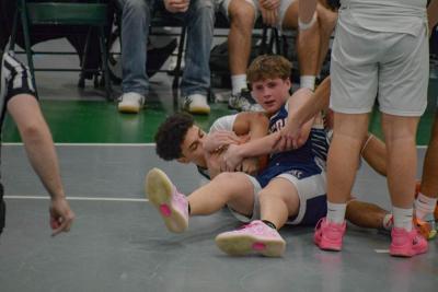 Jace Pina wrestles for the ball.
