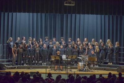 The eighth grade sings.