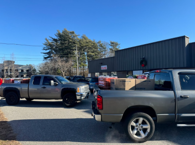 Two of the three trucks filled with toys.