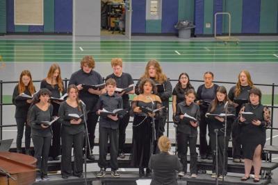 The chorus carols for the season.