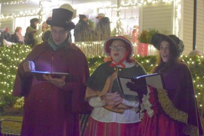 The Victorian Carolers serenade the crowd with Christmas favorites. 