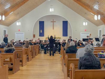 The Dartmouth High School Chamber Orchestra performs.
