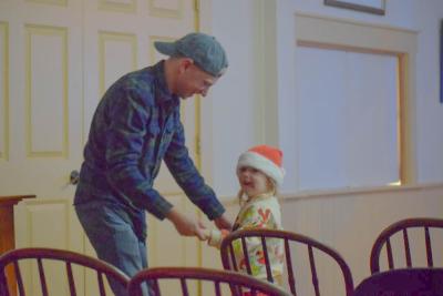 Isaiah Manely dances with his daughter Amelia.