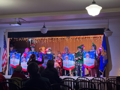 The Unlikely Strummers perform. 