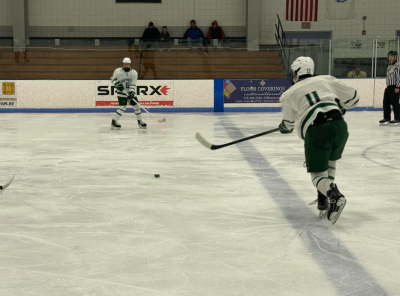 Lucas DeSousa passes the puck.