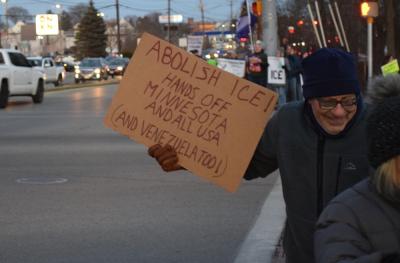 A sign calling for I.C.E. out.