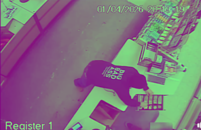 The robber, allegedly Nicholas Ouimet, on camera footage at Walgreens. Source: New Bedford Police Department