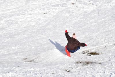 Penelope Vertentes, 10, flies over the ramp she built.