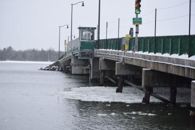 The harbor, partially icy and snowy.