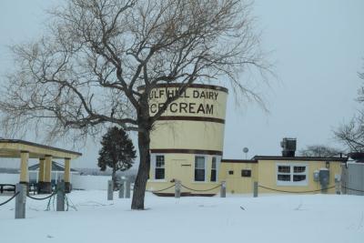 Gulf Hill Dairy surrounded by snow.
