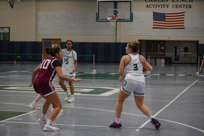 Madison Alves runs in front of Kaelyn Zuber.