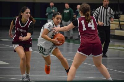 Samantha Murphy blocks Annaleyah Algarin. Photos by Kat Sheridan